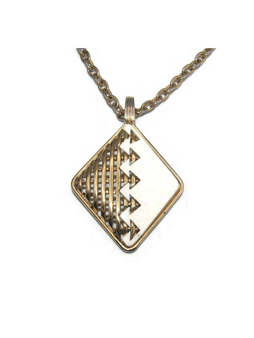 Vintage Gold Tone and White Enamel Pendant on 24 Inch Gold Tone Chain.